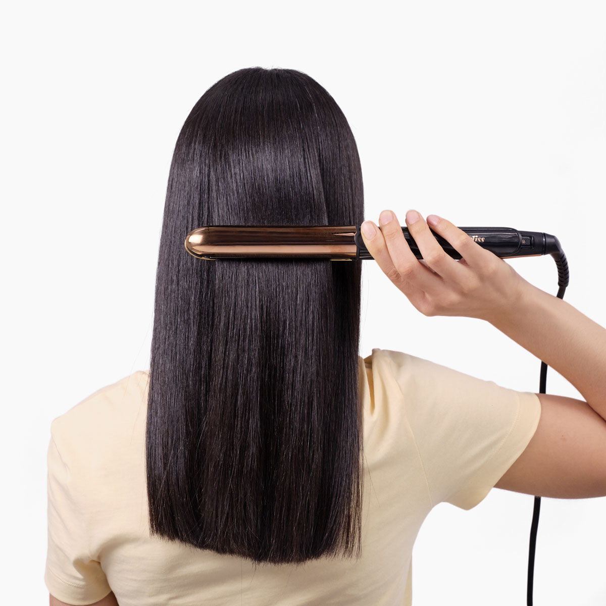 Titanium Brilliance Straight & Curl in Rose Gold in use on straightened hair